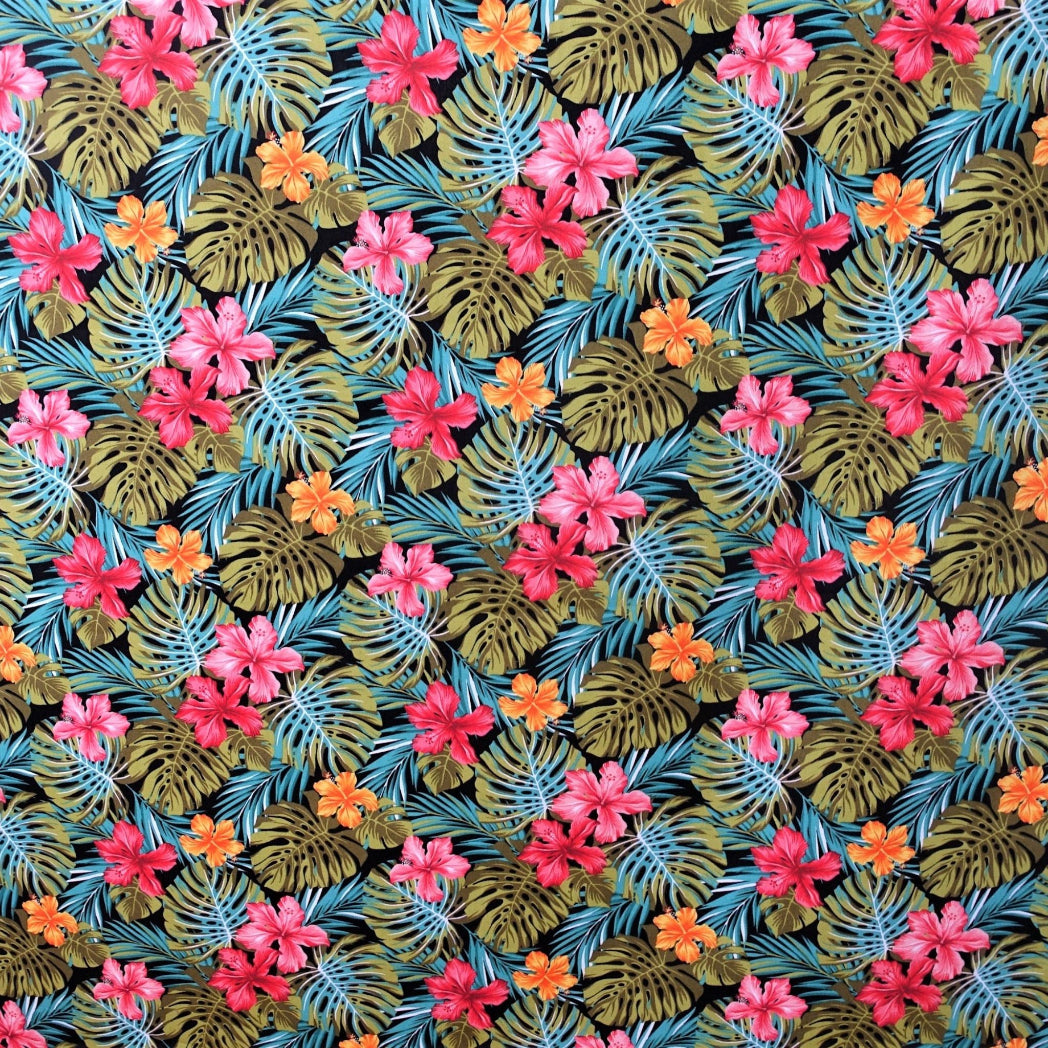 Tissu coton Hibiscus et Monstera rose orange vert fond noir motifs floraux polynésiens Couleurs du Fénua