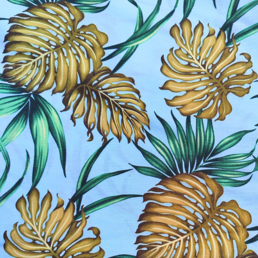 Détail motif Monstera et fleurs tropicales vert olive sur fond bleu turquoise 100% coton