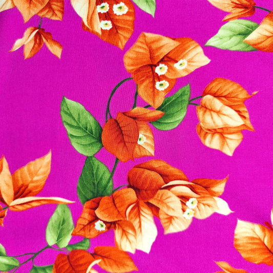 Détails du tissu tahitien en fibranne bougainvilliers orange sur fond rose fuschia Laize 150 cm