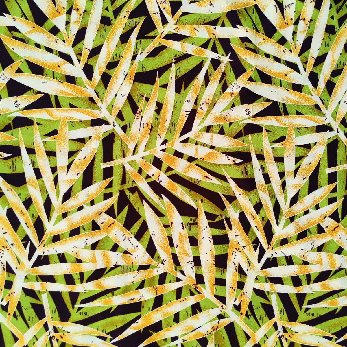 Tissu coton Feuillages Polynésiens vert, jaune et noir - motifs tropicaux stylisés sur fond noir