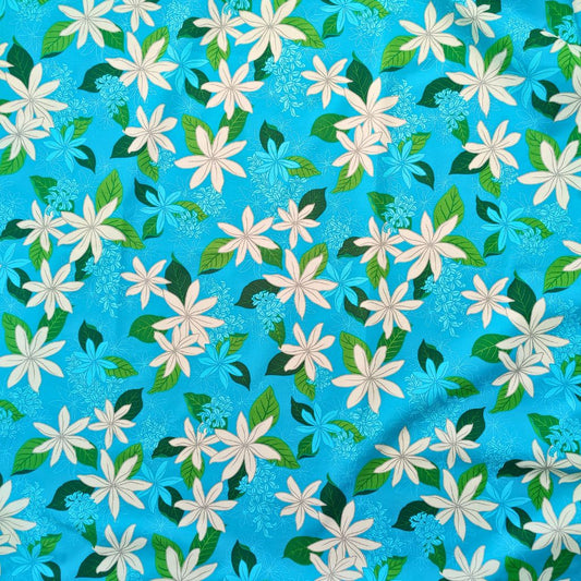 Tissu tahitien fleurs de tiaré blanches sur fond turquois. Edition limitée