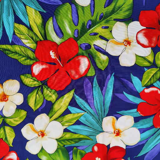 Détails du tissu tahitien en fibranne hibiscus rouge et blanc monsteras verte et feuillages turquoise sur fond bleu marine