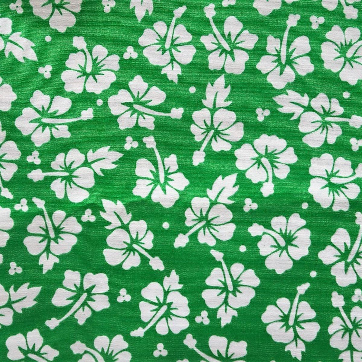 Détail motif Hibiscus blancs sur fond vert émeraude 100% coton