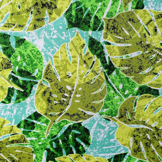 Détail motif Monstera camaïeu vert anis émeraude sur fond bleu lagon 100% coton
