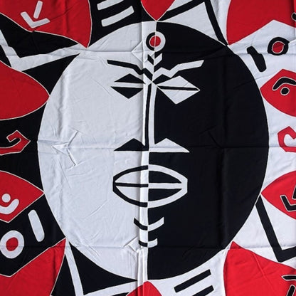 Paréo polynésien en fibranne représentant un soleil tribal rouge, noir et blanc. 175 x 115 cm
