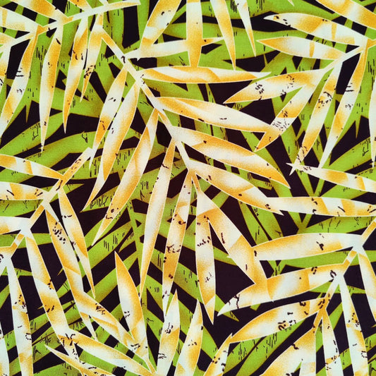 Détail motif feuillages tropicaux - dégradé vert, jaune ocre et blanc sur fond noir - tissu coton 115cm