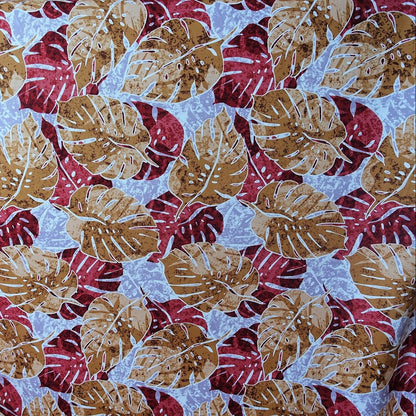 Tissu coton Monstera marron bordeaux fond bleu gris motifs tropicaux polynésiens Couleurs du Fénua