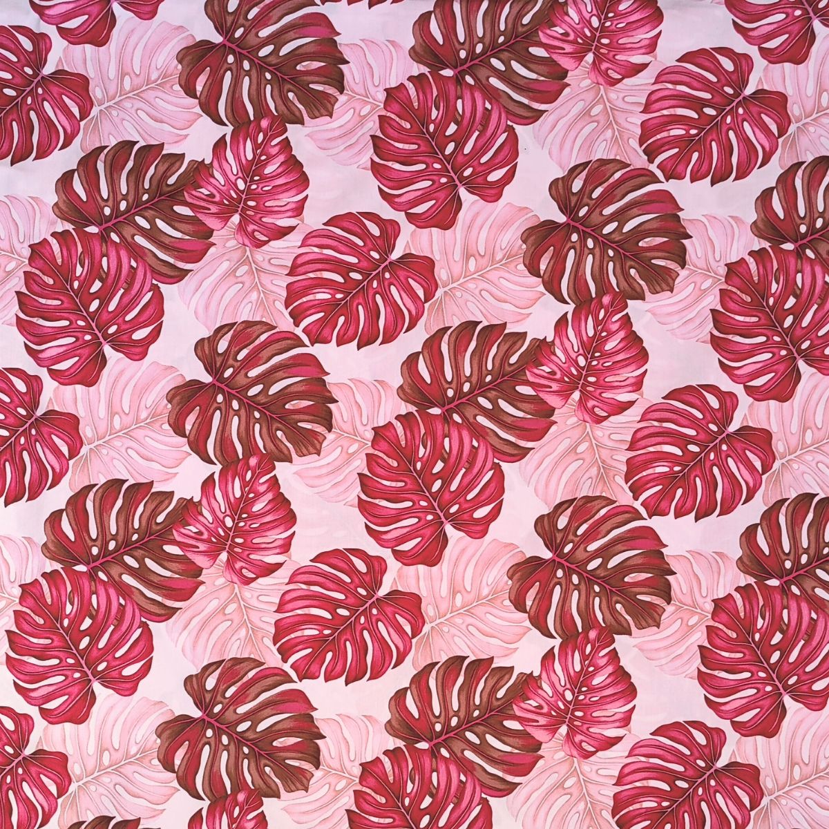 Tissu coton Monstera aquarelle rose bordeaux fond rose pâle motifs tropicaux polynésiens Couleurs du Fénua