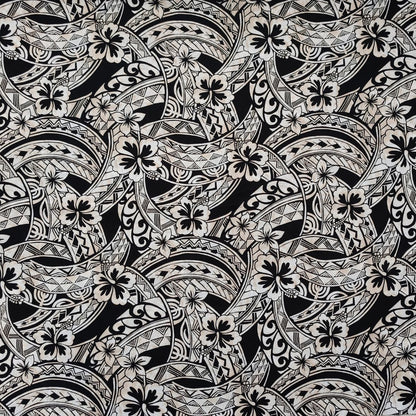 Tissu coton polynésien motifs hibiscus et tatouages géométriques beige sur fond noir profond - Couleurs du Fénua