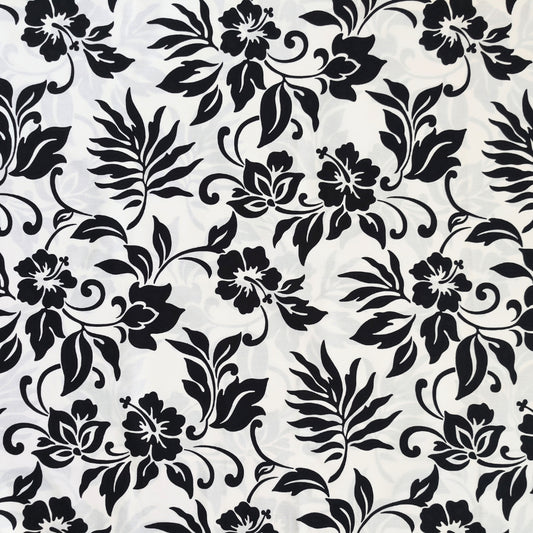 Tissu coton polynésien motifs hibiscus et feuillages stylisés, noir et blanc