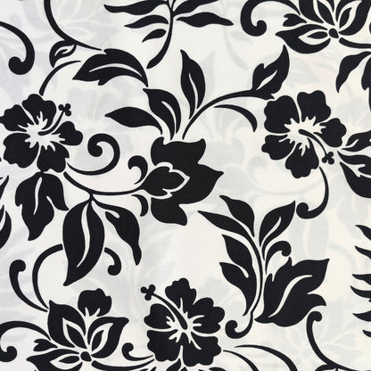 Tissu coton polynésien motifs hibiscus et feuillages stylisés, noir et blanc