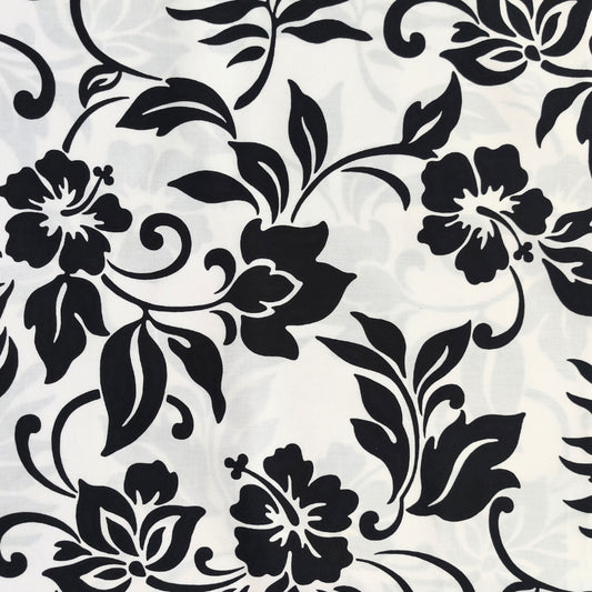 Tissu coton polynésien motifs hibiscus et feuillages stylisés, noir et blanc