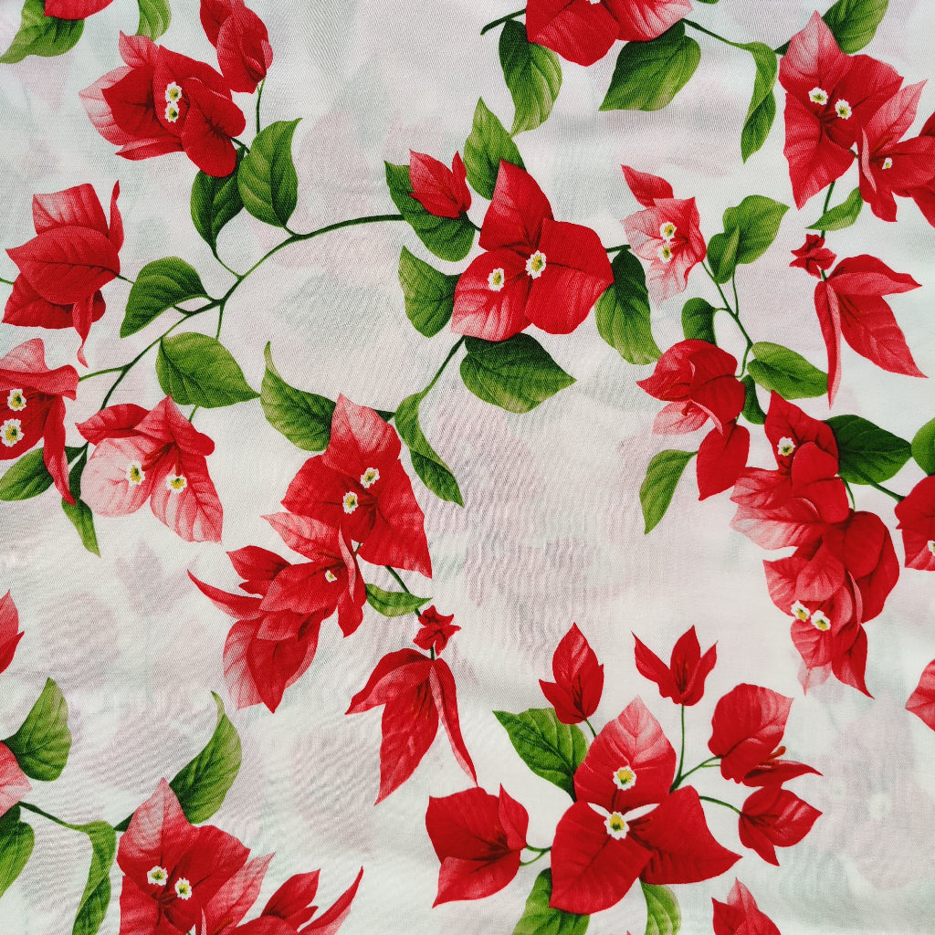 Tissu tahitien fibranne bougainvilliers rouge sur fond blanc lumineux parfait pour robes fluides ou kimono