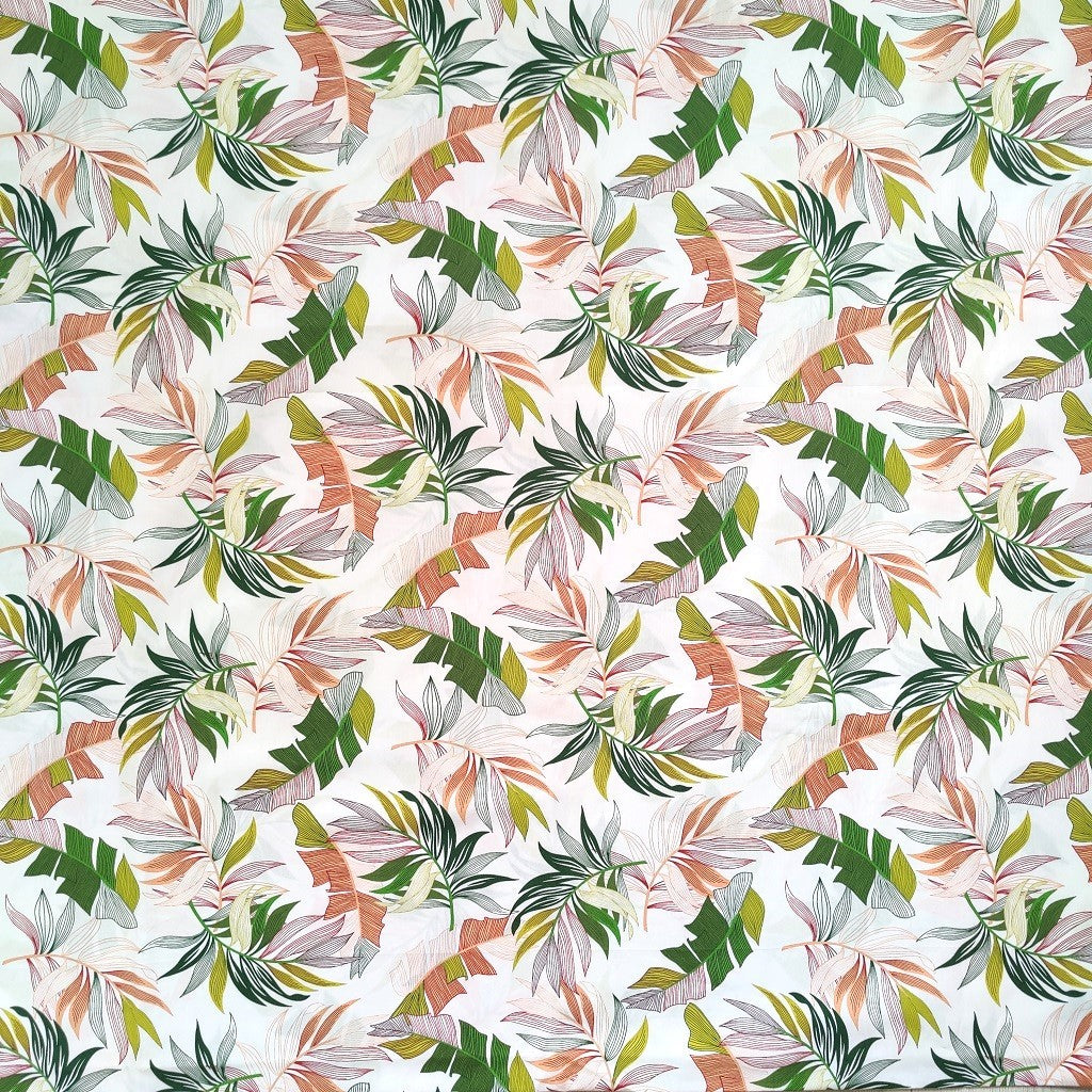 Tissu tahitien en coton, motifs feuilles de bananiers et fougères sur fond blanc lumineux. Edition limitée