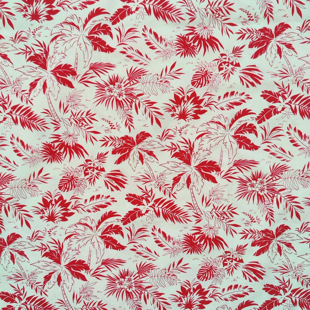 Tissu tahitien en coton, cocotiers et feuillages rouge et beige. Edition limitée