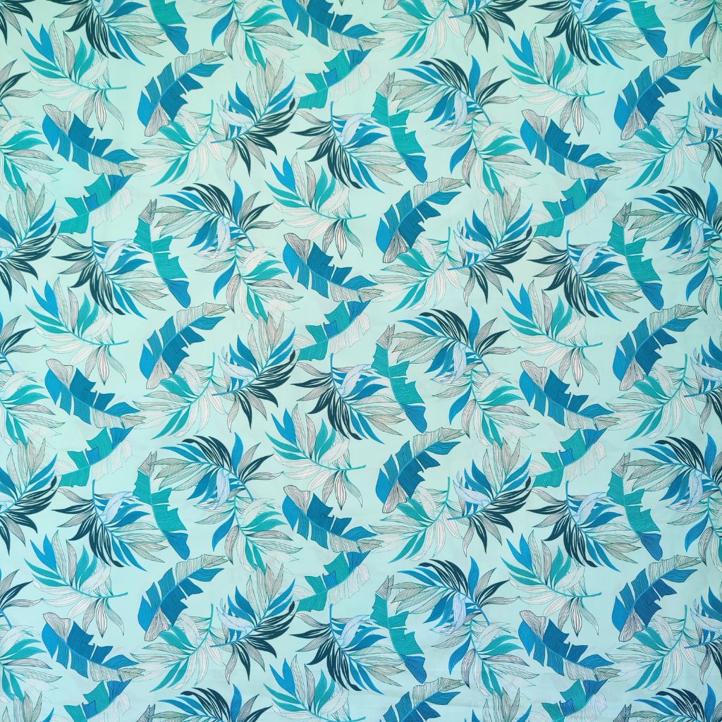 Tissu tahitien en coton, motifs feuilles de bananiers et fougères , camaïeu de bleu. Edition limitée - aucun réassort.