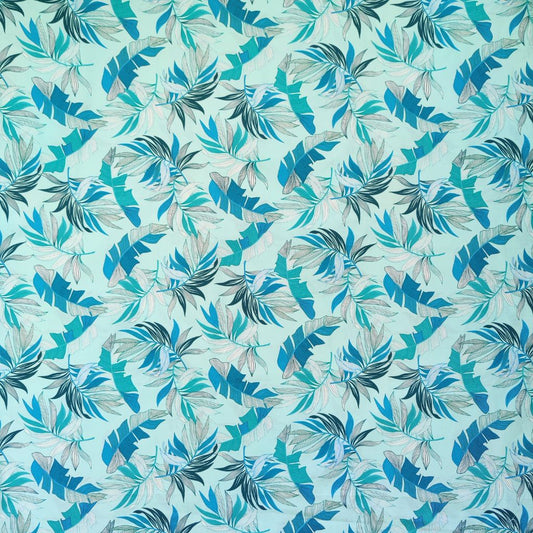 Tissu tahitien en coton, motifs feuilles de bananiers et fougères , camaïeu de bleu. Edition limitée - aucun réassort.