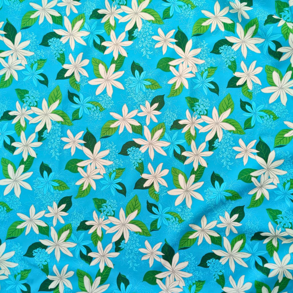 Tissu tahitien fleurs de tiaré blanches sur fond turquois. Edition limitée 
