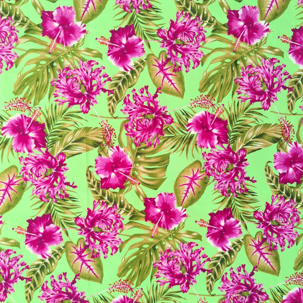 Tissu tahitien en coton motifs hibiscus rose de Chine et monstera, rose sur fond vert anis