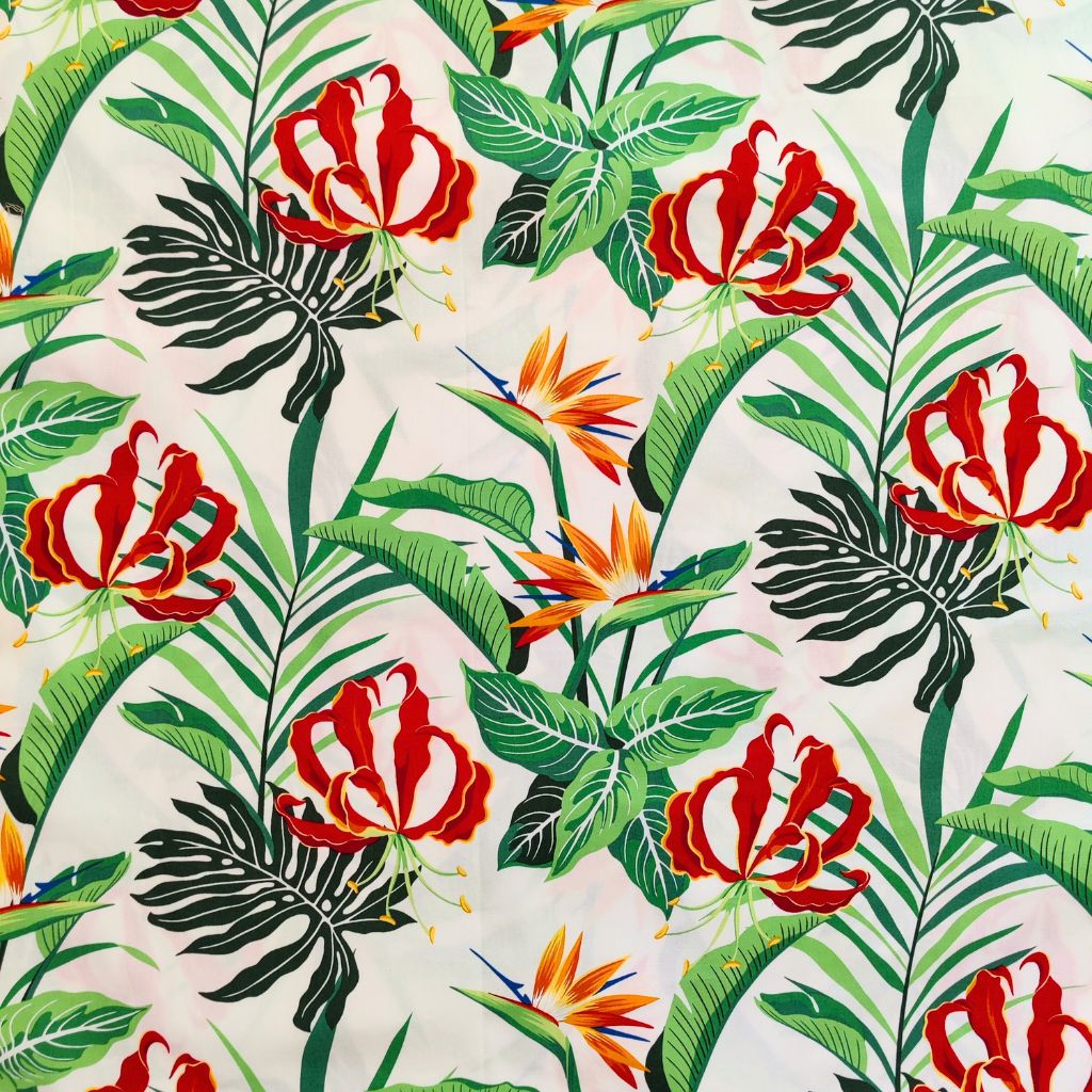 Tissu tahitien en coton, motifs oiseaux de paradis et feuillages tropical, vert et blanc