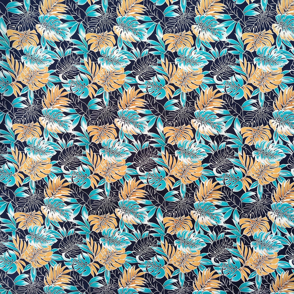 Tissu tahitien monstera en coton - couleurs bronze turquoise et bleu marine - Edition limitée 