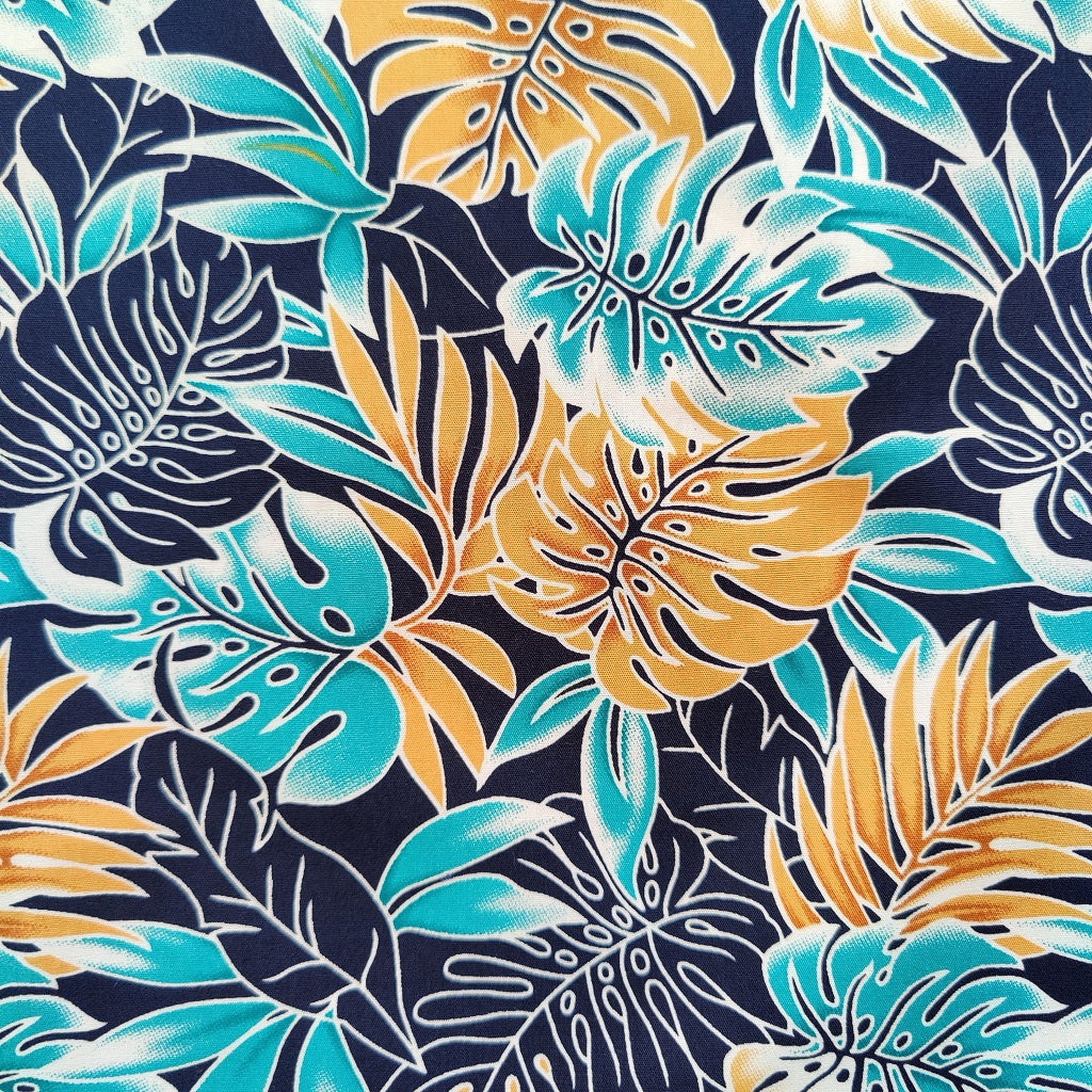 Détails Tissu polynésien monstera en coton - couleurs bronze turquoise et bleu marine - Edition limitée 