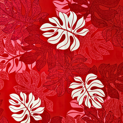 Tissu tahitien en coton, détails du motif  monstera tropical rouge et blanc. Edition limitée - coupon 2 mètres